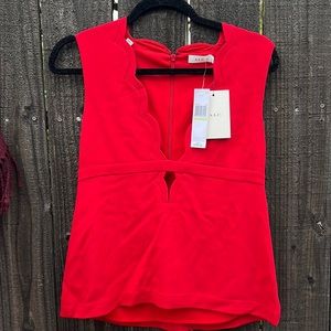 A.L.C plunging peplum top (tags on), size 4